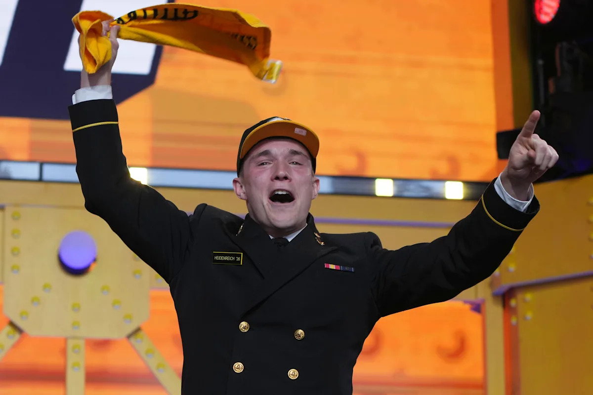 Navy teammates Landon Robinson -- Eli Heidenreich selected in 7th round observed today